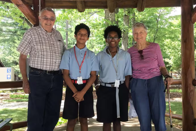 Ken and Carol Boyd with scholarship recipients Martin M. and Christopher J.