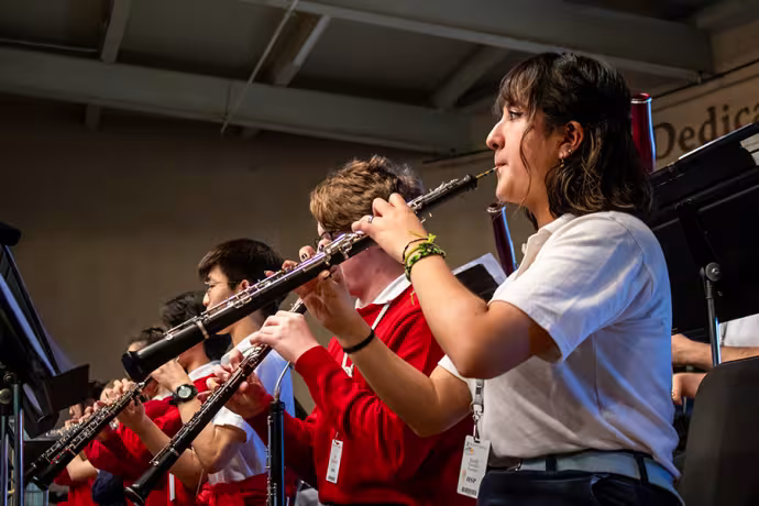The 2023 World Youth Symphony Orchestra performs in Kresge Auditorium.