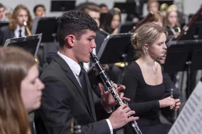 Interlochen Arts Academy student play clarinet during a Wind Symphony concert.