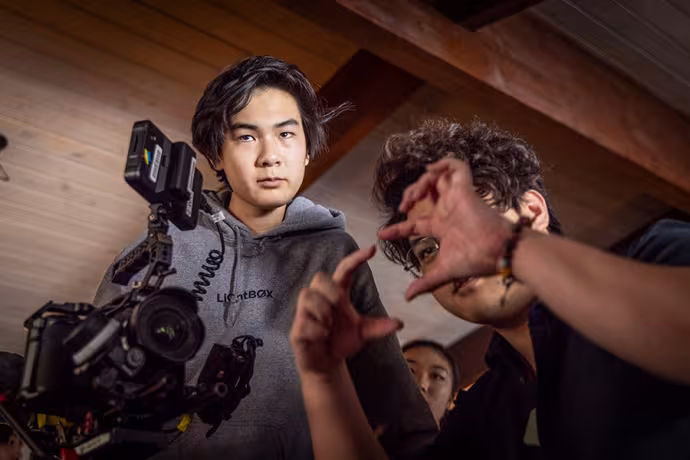 Two Interlochen Arts Academy students on a film set