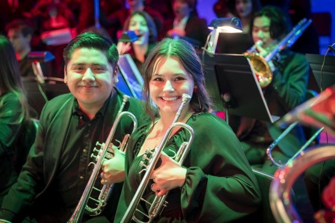 Two students smile during Sounds of the Season