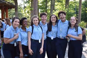 A group of friends pose on Osterlin Mall 