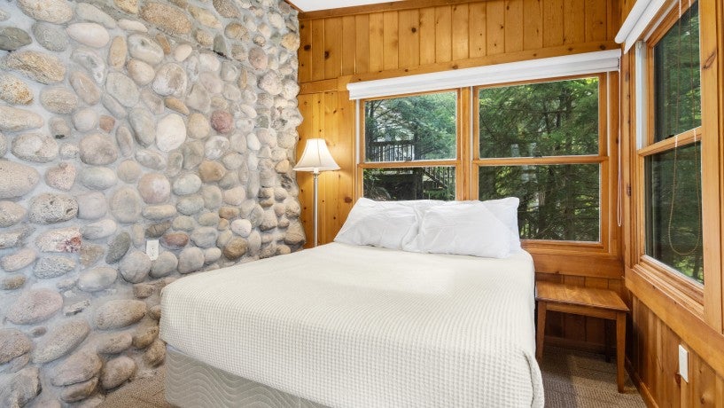  Maddy Cabin bedroom stone wall