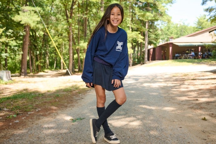 Interlochen Arts Camp student fashions an Interlochen sweatshirt