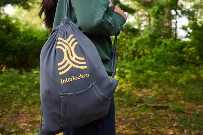 Interlochen Arts Camp student fashions a sweatshirt backpack