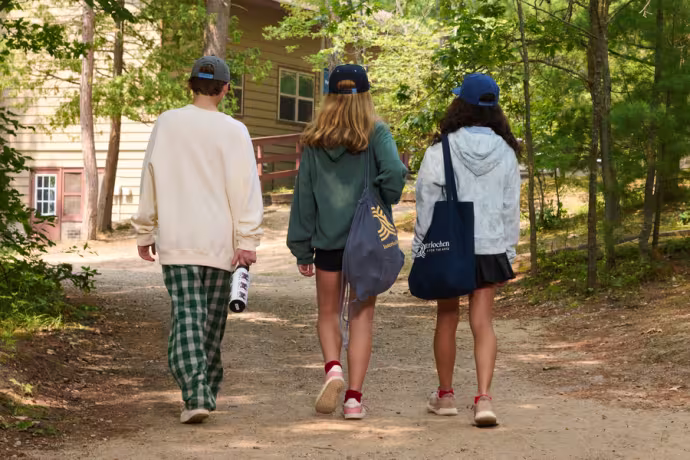 Interlochen Arts Camp intermediate students walk away from the camera