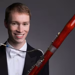 A man with a bassoon