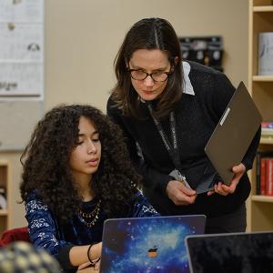 faculty and student review work on computer together at interlochen arts academy