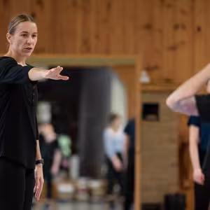 Katie Dorn (right) works with a dance student during a recent class.