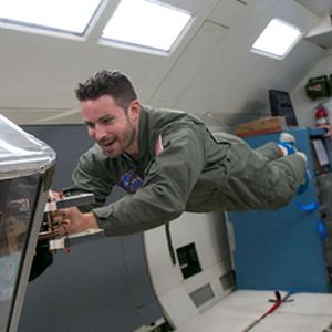 Aaron Parness in zero gravity
