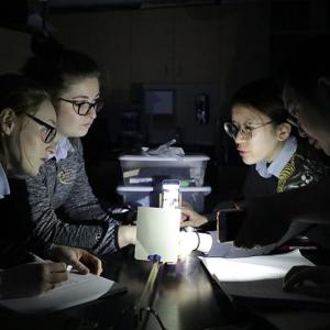 Arts Academy students conduct a physics experiment