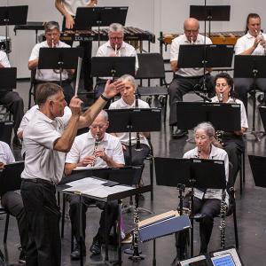 Photo of conductor leading Adult Band Camp concert
