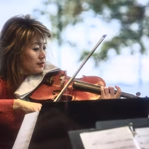 Tina Qu performs during the Dance Center dedication ceremony.