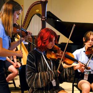 Valade Concertmaster Celeste Golden Boyer coaches students at Interlochen Arts Camp in 2021.