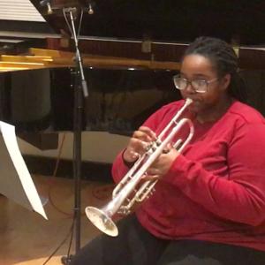 An Interlochen Arts Academy senior plays trumpet