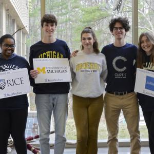 Class of 2022 students post with college acceptances