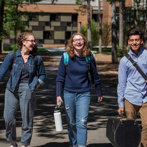 Three Interlochen Arts Academy students walk to their next class.