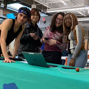 Student volunteers host the Act for Art kick-off party on May 3, 2023. 