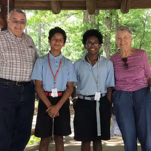 Ken and Carol Boyd with scholarship recipients Martin M. and Christopher J.