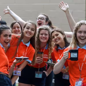 A group of counselors prepare to welcome Arts Camp students during Opening Weekend.