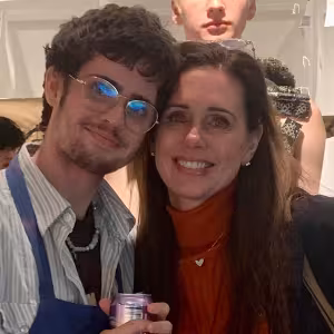 Lukas Drysdale and his mother at a gallery opening in the Dow Center for Visual Arts