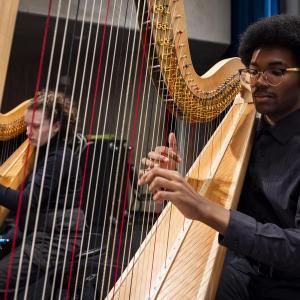 Interlochen Arts Academy harp student performs in orchestra