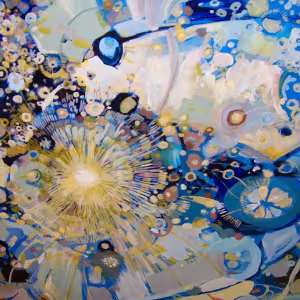 A photograph of a ceiling painted with celestial shapes in blue and gold.