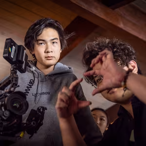Two Interlochen Arts Academy students on a film set