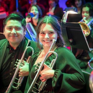Two students smile during Sounds of the Season